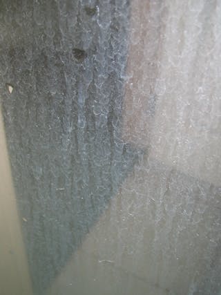Shower Glass Door With Hard Water Stains_Desktop